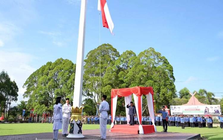 Pemkab Kobar Upacara Bendera Peringati HUT ke 67 Provinsi Kalteng dan Harkitnas ke 116