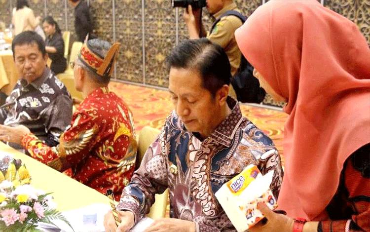 Pj Bupati Barut Ikuti Rapat Umum Pemegang Saham Tahunan PT Bank Kalteng