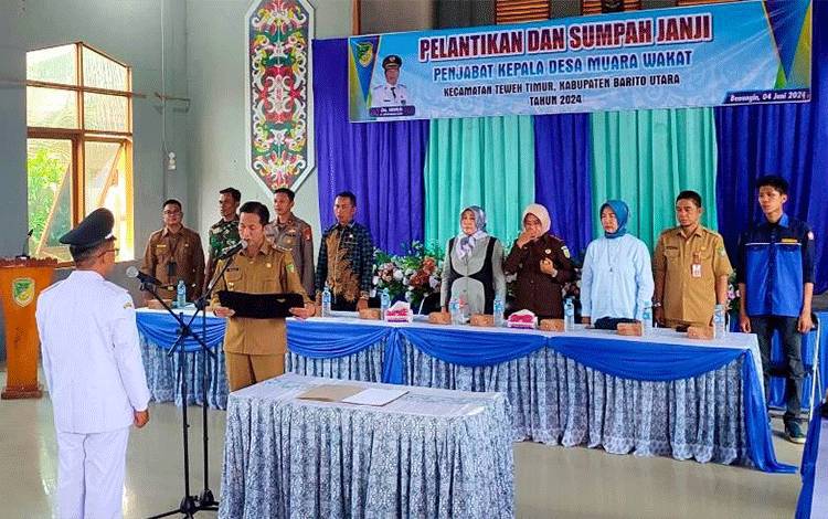 Pj Bupati Barito Utara Lantik Pj Kepala Desa Muara Wakat