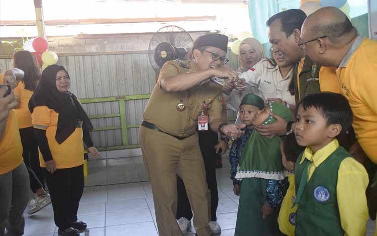 Pj Bupati Barito Timur Buka Pekan Imunisasi Nasional Polio Tahap II