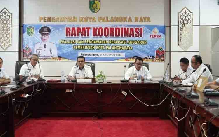 Pemko Palangka Raya Rapat Koordinasi Tim Evaluasi dan Pengawasan Realisasi Anggaran Secara Daring