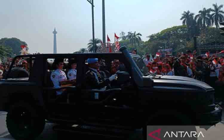 Kirab Bendera Pusaka Berganti Formasi di Kawasan Patung Kuda