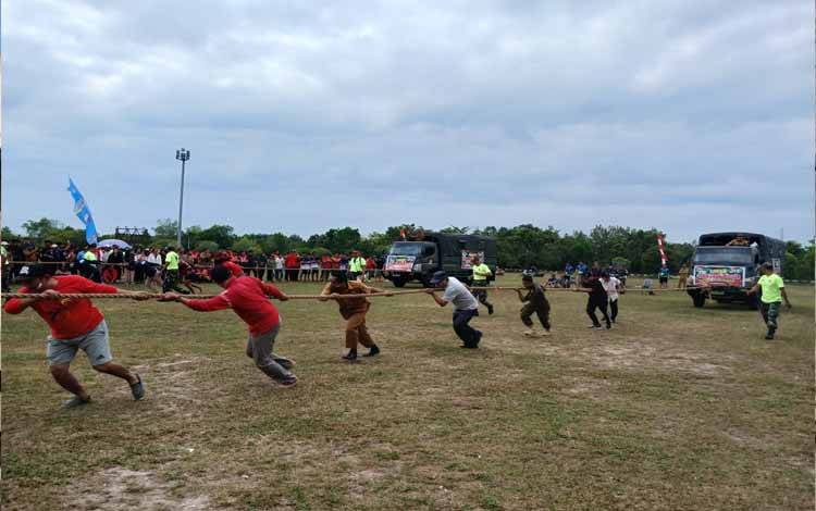Kodim Katingan Gelar Lomba Tarik Truk Militer Meriahkan HUT RI ke 79