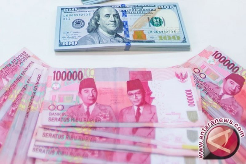 Ilustrasi - Mata uang Rupiah dan dolar AS. (ANTARA FOTO/Widodo S. Jusuf)