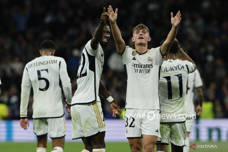 Arsip foto - Gelandang Real Madrid asal Argentina #32 Nico Paz merayakan gol ketiga timnya pada pertandingan sepak bola grup C putaran pertama Liga Champions UEFA antara Real Madrid CF dan SSC Naples di stadion Santiago Bernabeu di Madrid pada 29 November 2023. (ANTARA/AFP/Oscar Del Pozo)