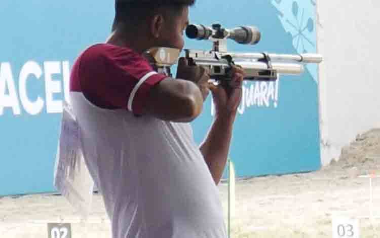Atlet tembak Kalteng, Fadhil Yusuf Bahreizy meraih posisi 6 di nomor Metal Silhouette Multi Range PON XXI Aceh-Sumut 2024. (FOTO: HUMAS KONI KALTENG)