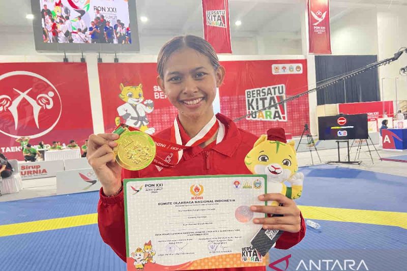 Ni Kadek Heni Raih Emas PON XXI dan Tampilkan Dominasi Taekwondo