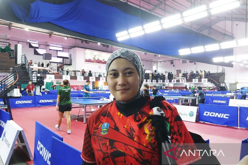 Christine Ferliana, Jilbab Loreng yang Bawa Keberuntungan di PON