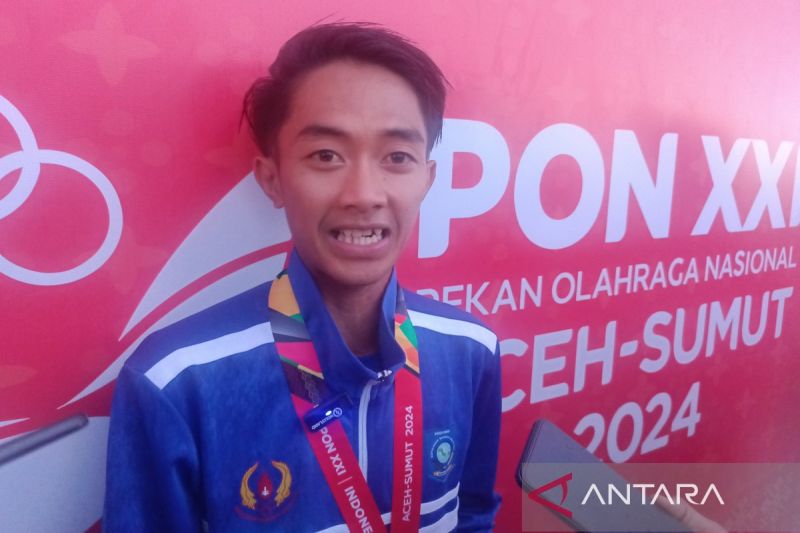 Robi Syianturi Raih Emas 10.000 Meter, Tantangan Cuaca Panas