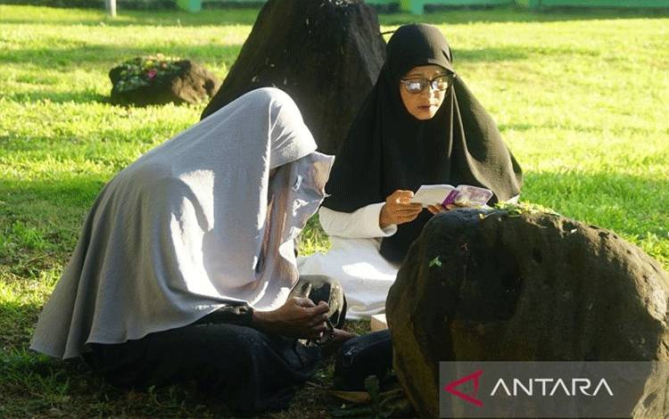 Penyintas: 20 Tahun Tak Pernah Putus Berdoa di Kuburan Massal Tsunami