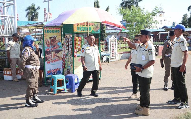 Satpol PP Seruyan Sosialisasikan Ketertiban Pedagang Jelang Justice Fun Run 2025
