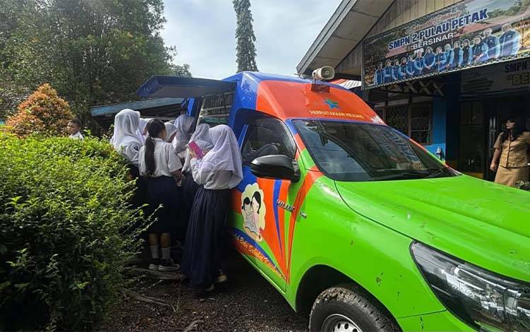Perpustakaan Keliling Kapuas Dorong Peningkatan Minat Baca Masyarakat Kapuas