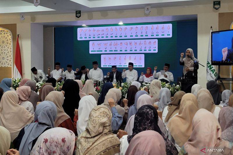 Cahaya Zakat Menembus Sunyi Teman Tuli Lewat Mushaf Al-Qur'an Isyarat