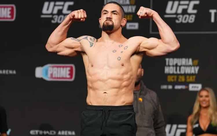 Mantan Juara UFC Whittaker Incar Pertarungan Lawan Strickland