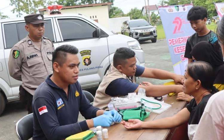 Bakti Kesehatan Gratis Polres Pulang Pisau Hari Bhayangkara ke-73 Diserbu Warga