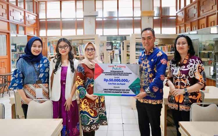 Bank Kalteng Beri Bantuan Dispursip Dukung Pengembangan Literasi