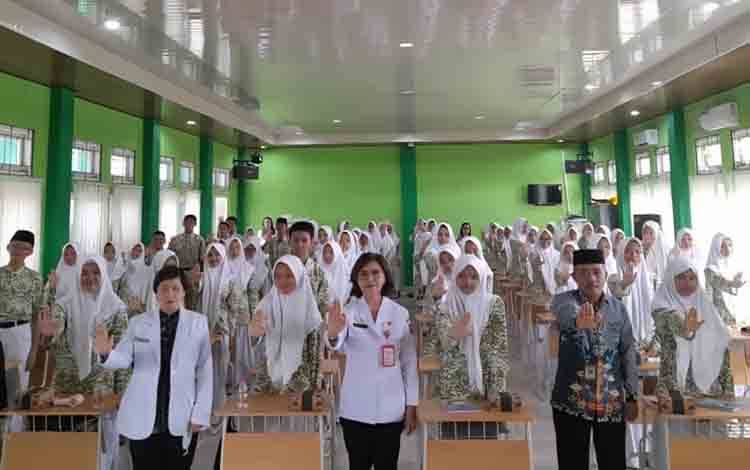 IDAI, Ditreskrimsus dan HIMPSI Kalteng Ajak Siswa Cegah Kekerasan dan Pernikahan Dini