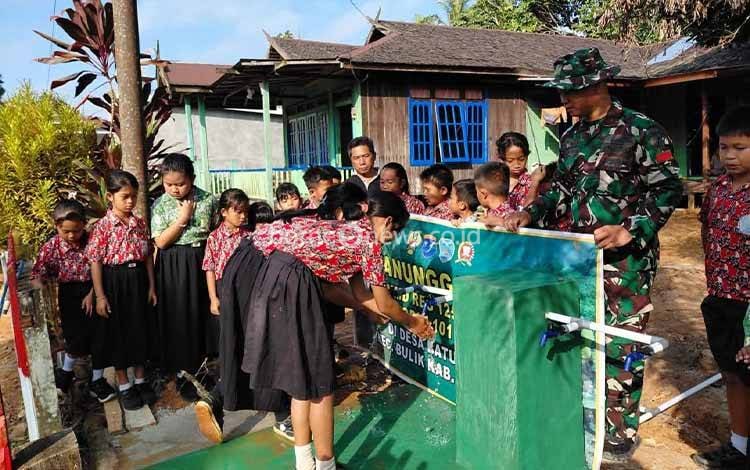 Program TMMD di Lamandau Berikan Solusi Air Bersih Berkelanjutan untuk SD Batu Kotam