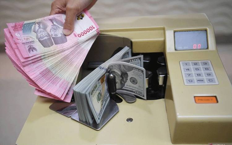 Rupiah Menguat Seiring BI Tahan Suku Bunga