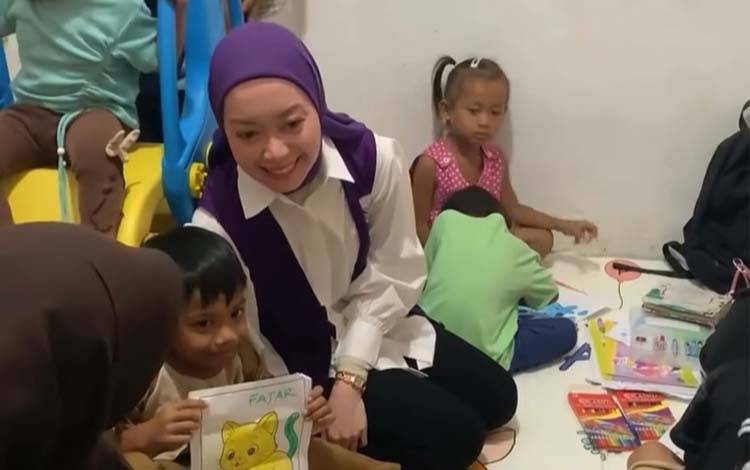 Ketua Tim Pembina Posyandu Palangka Raya Ajak Masyarakat Palangka Raya Gemar Makan Ikan
