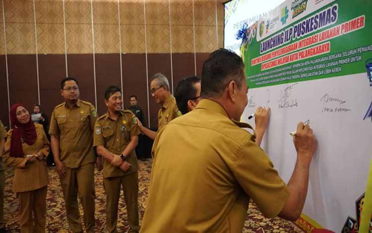 Penandatangan launching ILP Puskesmas di Swiss-Belhotel Danum Palangka Raya (Foto:MARINI)
