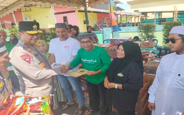 Polda Kalteng Gelar Bakti Sosial Bagi Jamaah Haul 5 Rajab Menuju Kalsel
