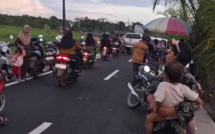 Warga Kota Besi Gembira Berwisata di Jalan Tengku Gembong Beraspal Mulus sambil Menikmati Pemandangan Hijau dan Udara Sejuk