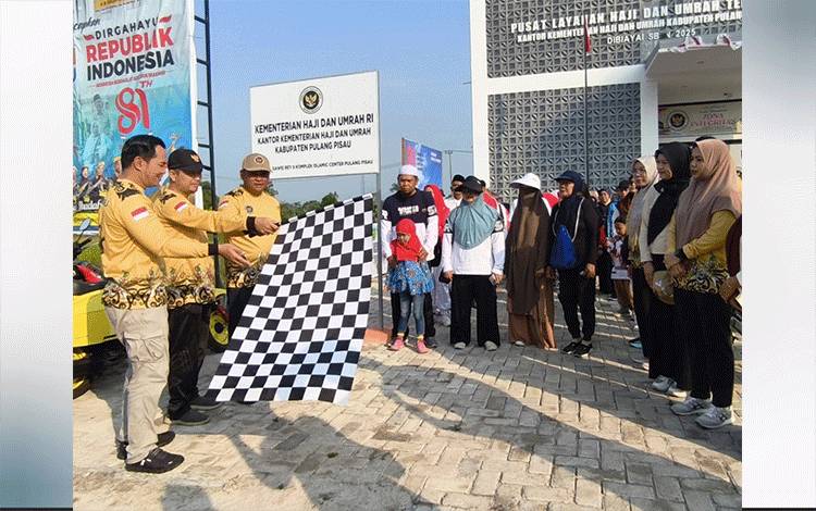 Bupati Pulang Pisau Lepas Jalan Sehat Mabrur dan Berkah, Ingatkan Warga Pilih PPIU Resmi