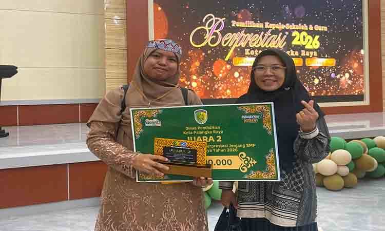 Jesiati Raih Juara II Kepala Sekolah Berprestasi Tingkat Kota Palangka Raya